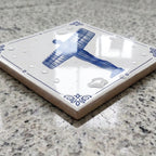 Decorative Delft blue tile – water resistant surface close-up