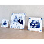 Custom printed non-floral ceramic tile displayed upright in Delft blue style
